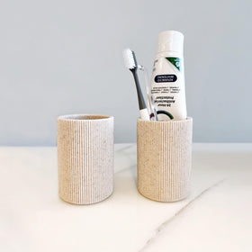 Lunestella toothbrush holder doubles as a pen or makeup brush organizer.