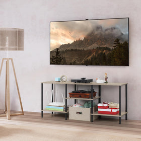 Luplom open shelves facilitate device display and easy cable management.