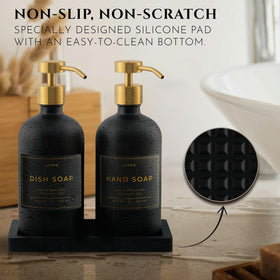Brushed gold pumps on black glass bottles add luxury and reliable dispensing.