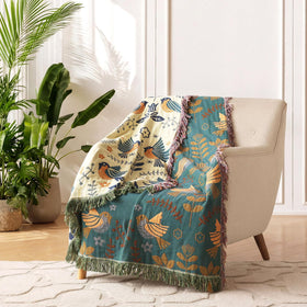 Floral and bird motifs on LUTBM blanket provide vibrant boho decor impact