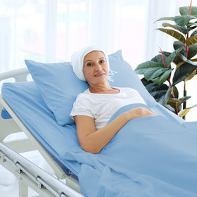 Luv4babe blue bed sheets neatly arranged on a bed.