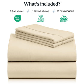 LuxClub 4pc king sheet set flat sheet draped over a plush mattress.