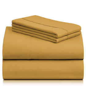 LuxClub 4pc queen sheet set variety of colors in a coordinated bedroom scene.