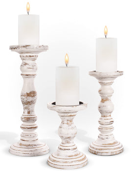 Luxe Designs pillar candle holders 3pc white create a warm table centerpiece.