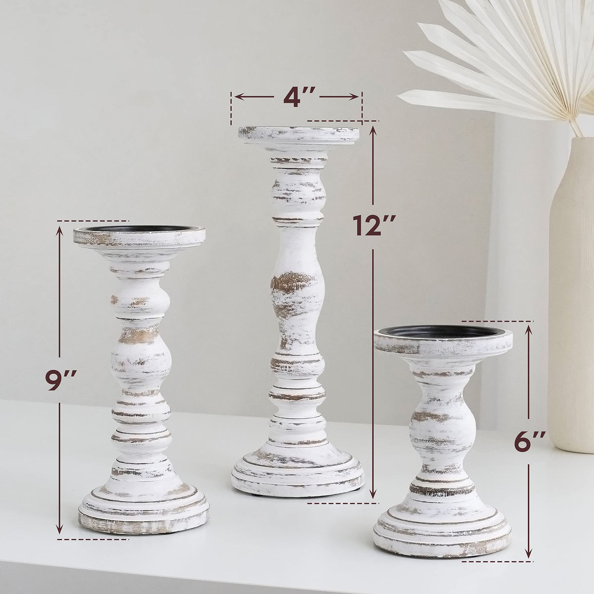 Luxe Designs table centerpiece display in white enhances living room decor.