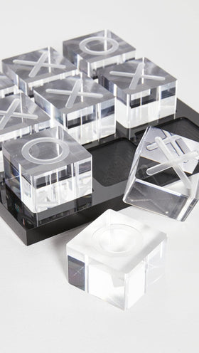 LuxLand Home clear XO pieces for tactile gameplay on display.