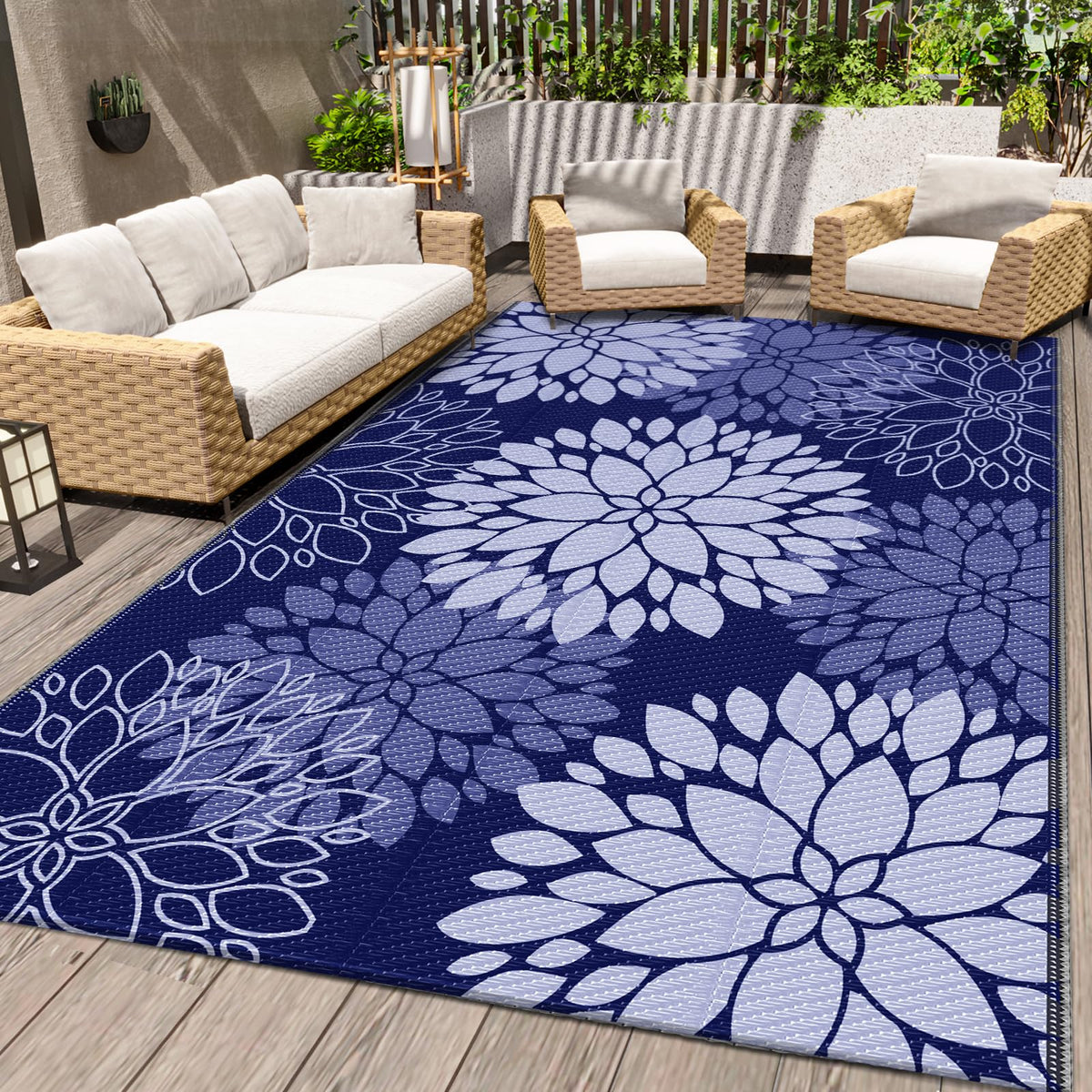 LuxStep Outdoor Rug with flower-pattern reversible blue design for patios and picnics.