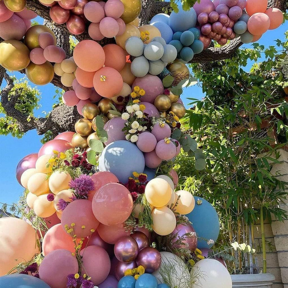 LUXURparty pastel balloon garland in rose gold and purple chrome for elegant celebrations.