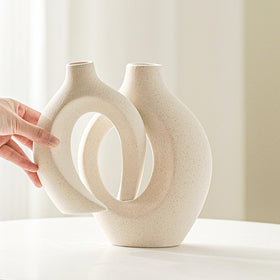 Lvases Snuggle Hollow short milky white vase ideal for shelf display and pampas grass