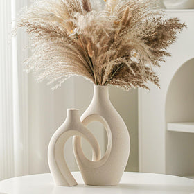 Lvases Snuggle Hollow tall cream vase with rounded silhouette and warm feel