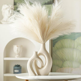 Close-up of Lvases Snuggle Hollow frosted ceramic surface