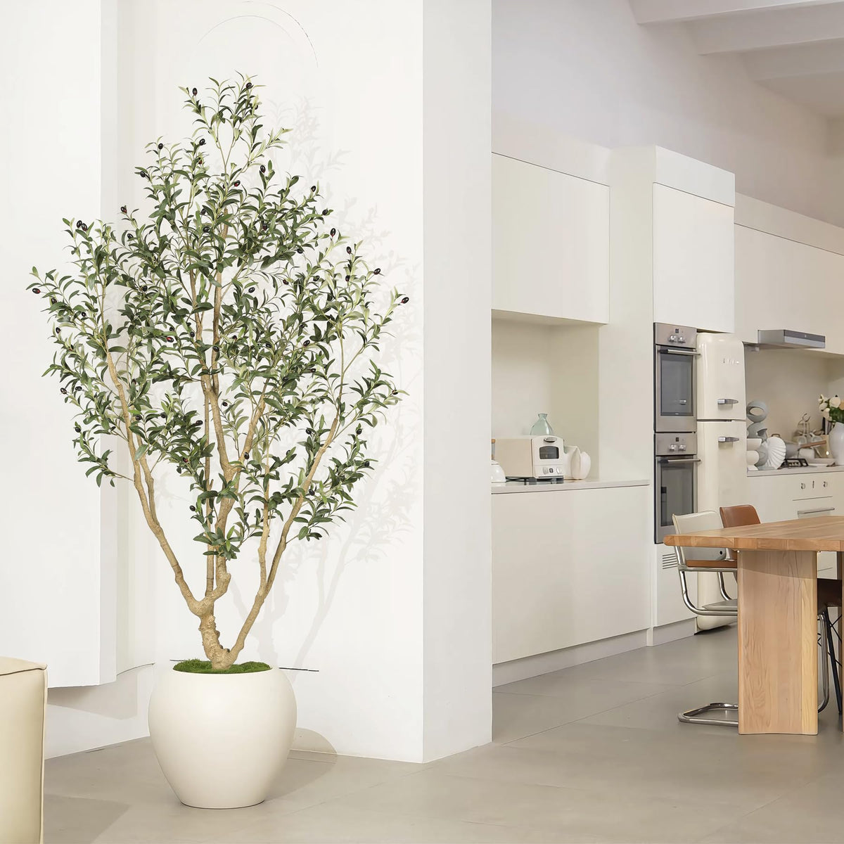 LYERSE faux olive tree suits home, office, or reception decor.