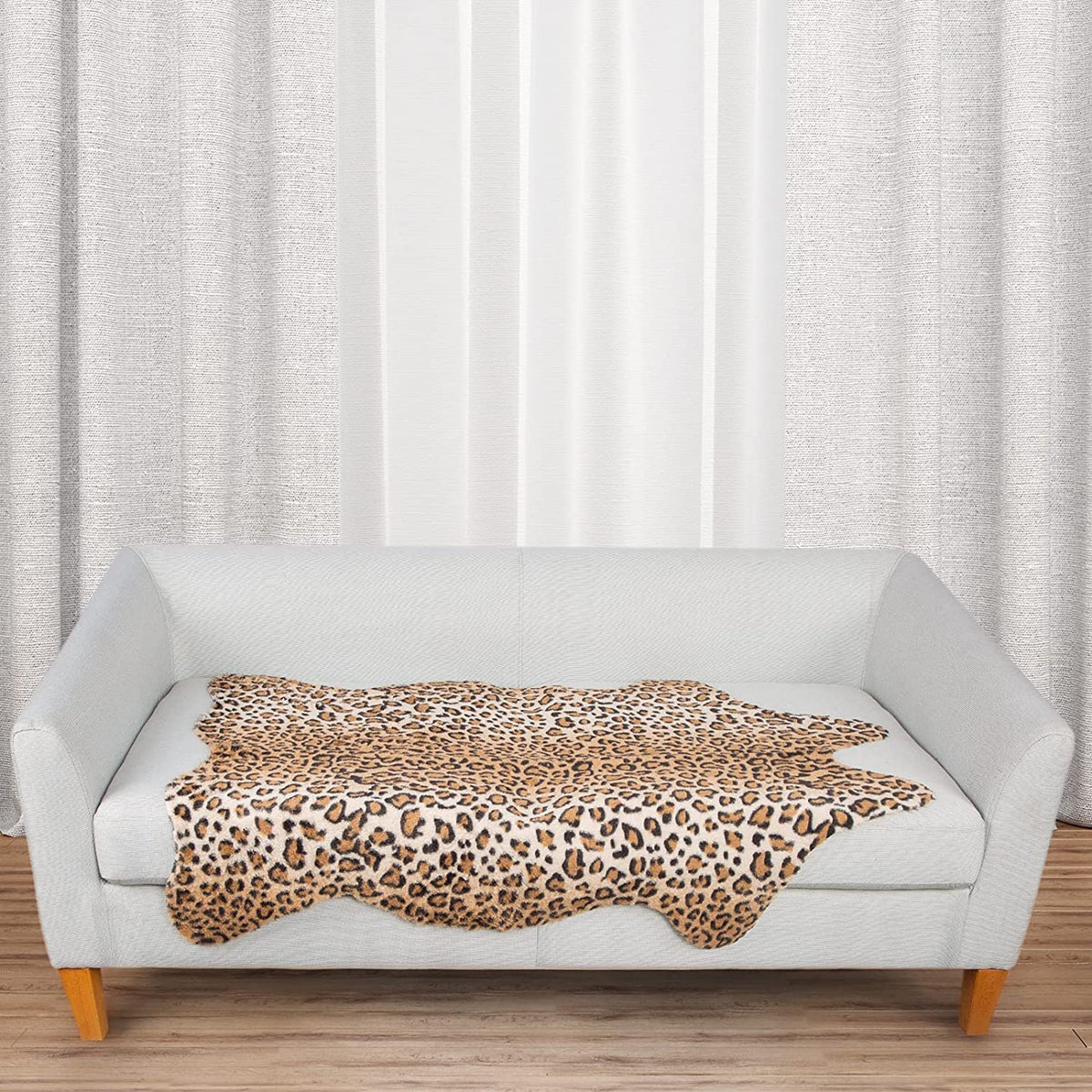 MACEVIA Leopard Rug in bedroom for comfort and slip-resistant floor protection.