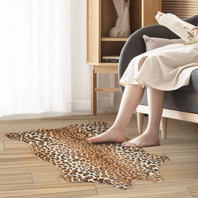 MACEVIA Leopard Rug features non-slip backing to stay in place on smooth floors.