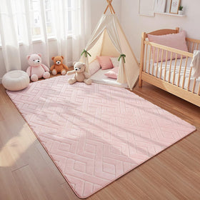 Macgace pink geometric shag rug adds modern style to a kid's space.