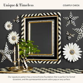 MACKENZIE-CHILDS bee decor with golden accents elevates entryways and mantels.