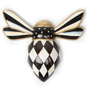 MACKENZIE-CHILDS hanging bee decor with Courtly Check adds a striking living room focal point.