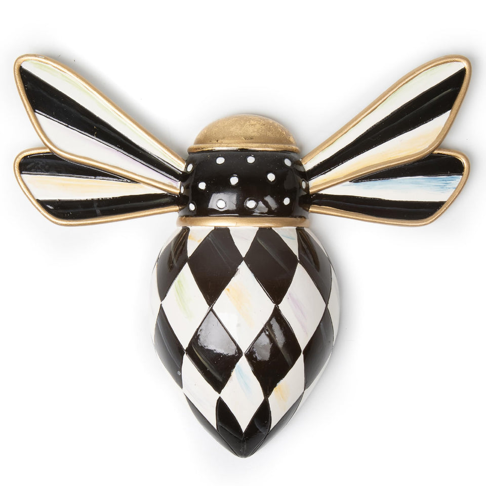 MACKENZIE-CHILDS hanging bee decor with Courtly Check adds a striking living room focal point.