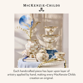 Table centerpiece enamel vase by MacKenzie-Childs for dining space