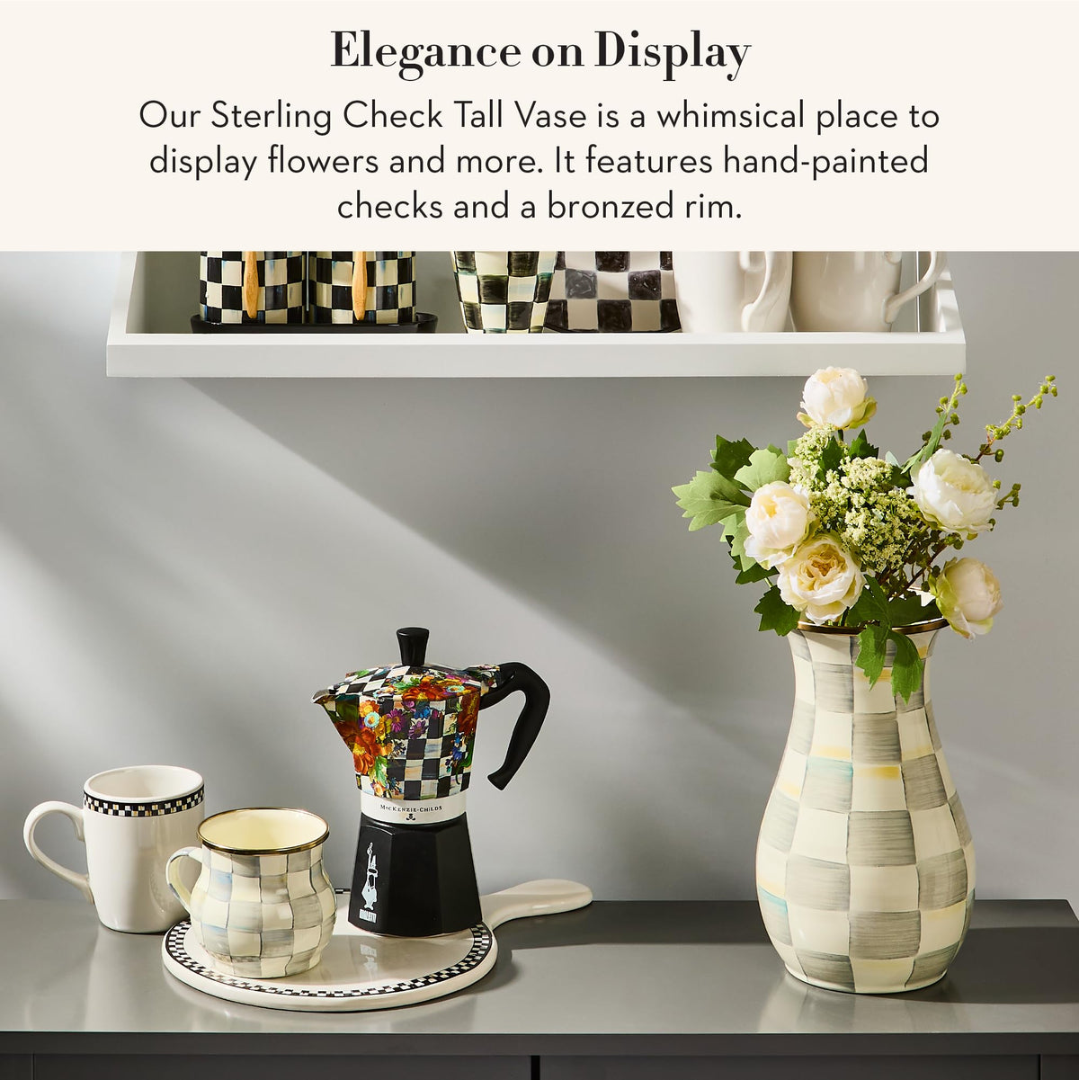 Mackenzie-Childs gray-and-white Sterling Check vase on table for versatile decor