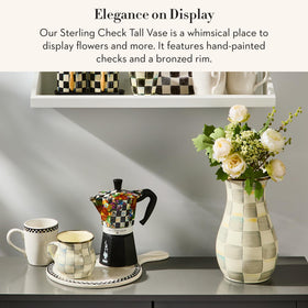 Mackenzie-Childs gray-and-white Sterling Check vase on table for versatile decor