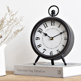 MACVAD Vintage Black Table Clock on Stand on a polished desk for elegant timekeeping.