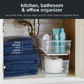 Madesmart kitchen cabinet storage maximizes vertical space for spices and cleaners.