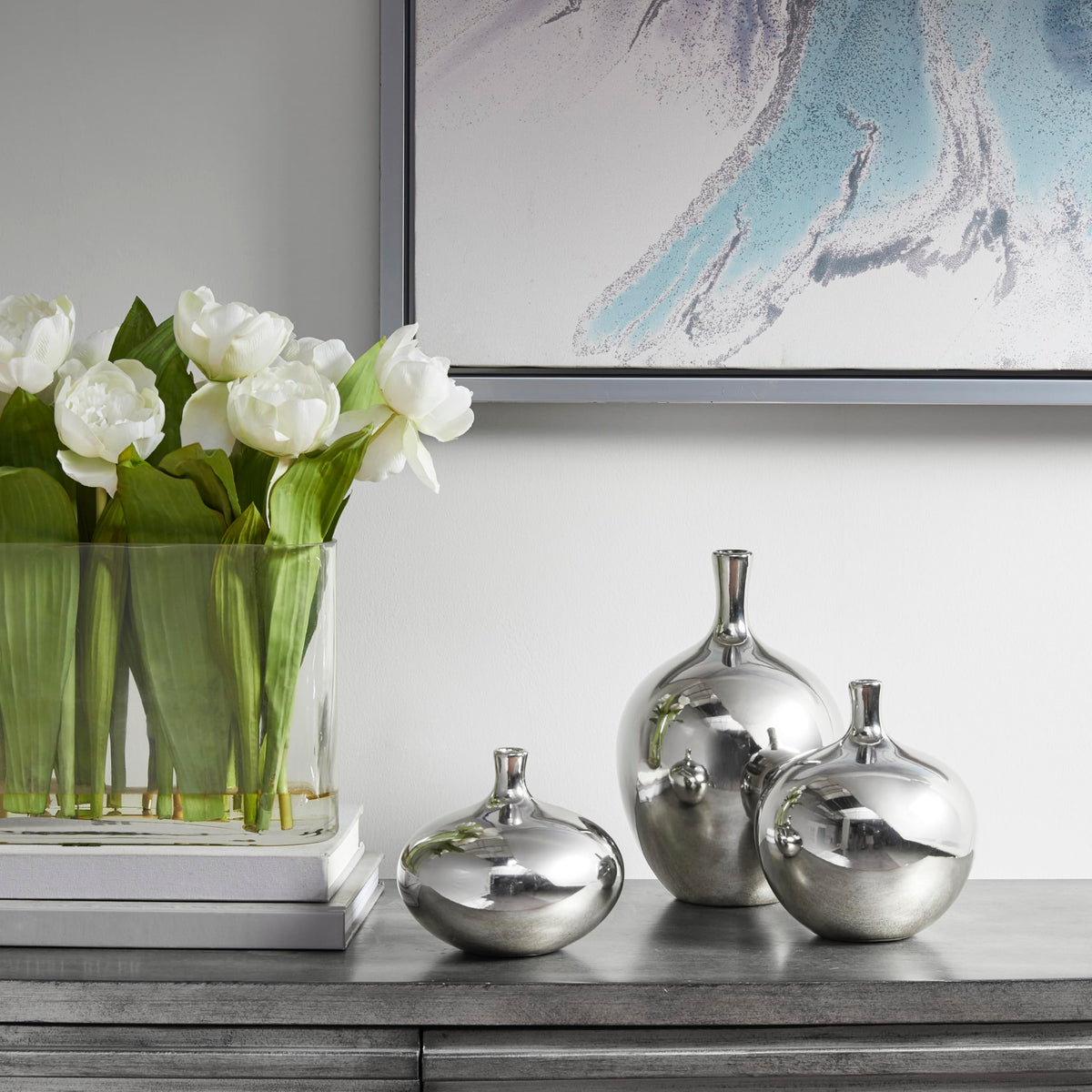 Madison Park Ansen vases in varied shapes create balanced displays.