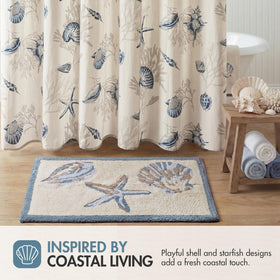 Bayside blue bath mat placed beside sink for a spa-like bathroom feel.