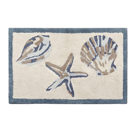 Madison Park Bayside shells bath mat blue with plush tufted texture for soft foot comfort.