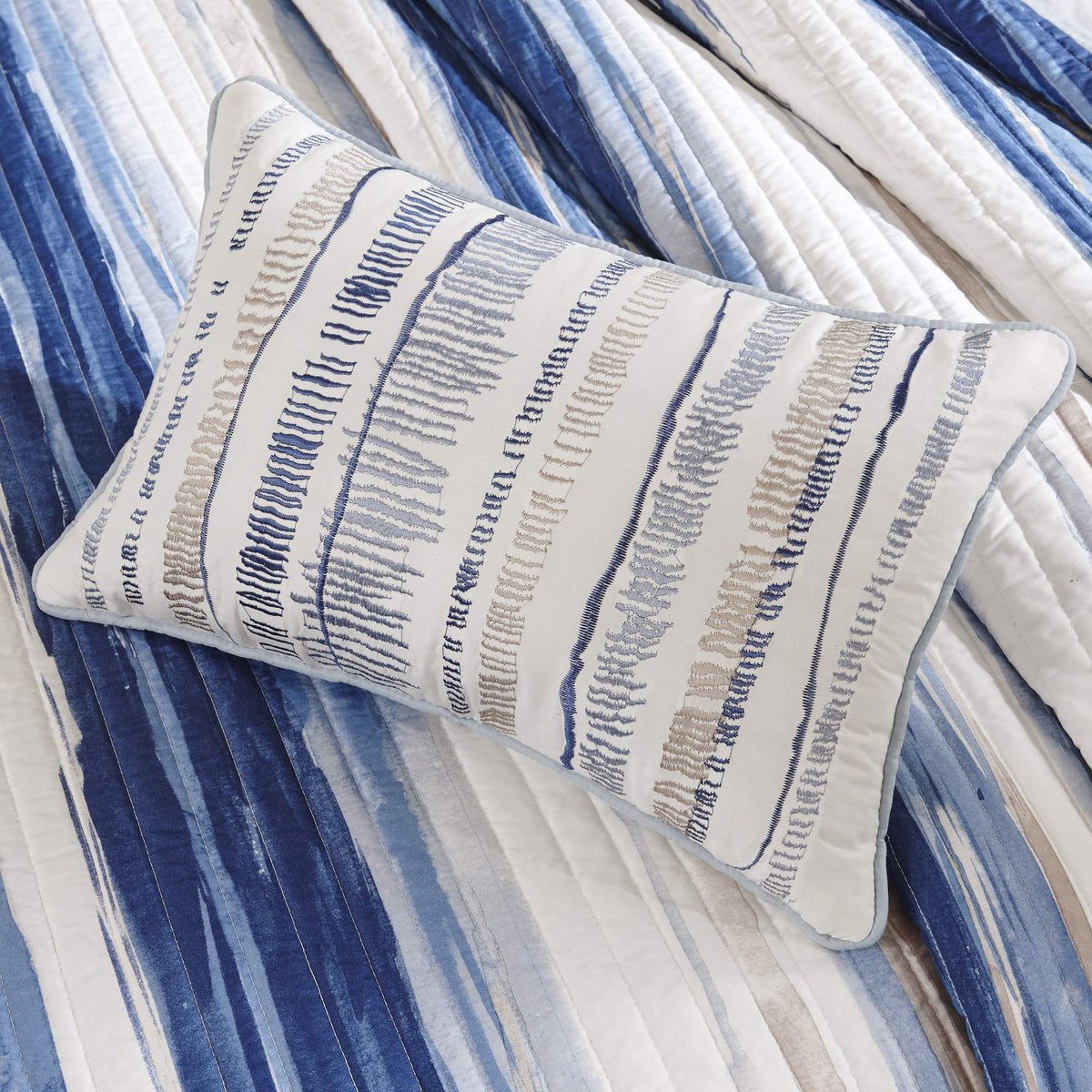 Madison Park Marina pillow with seashell embroidery adds texture and coastal charm