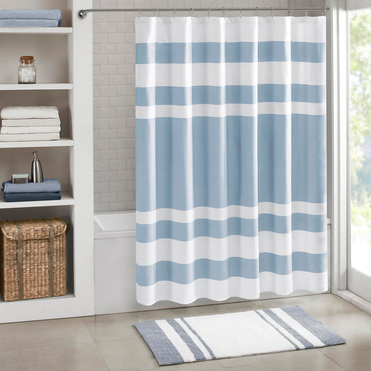 Madison Park Spa Waffle Shower Curtain in blue stripe elevates bathroom spa feel
