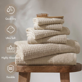 Close-up of Madison Park Spa waffle texture showing rich jacquard weave