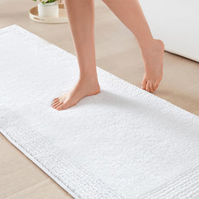 Madison Park Splendor bath rug, top view, showcasing dense tufted texture.