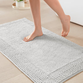 Madison Park Splendor bath rug top view highlights dense tufted texture for luxurious softness.