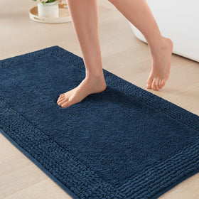 Madison Park Splendor tufted top navy bath rug with spa-like softness