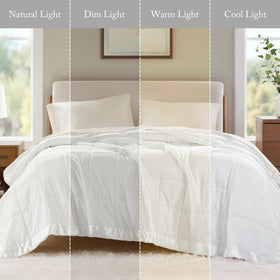 Madison Park Windom king-size white blanket on bed