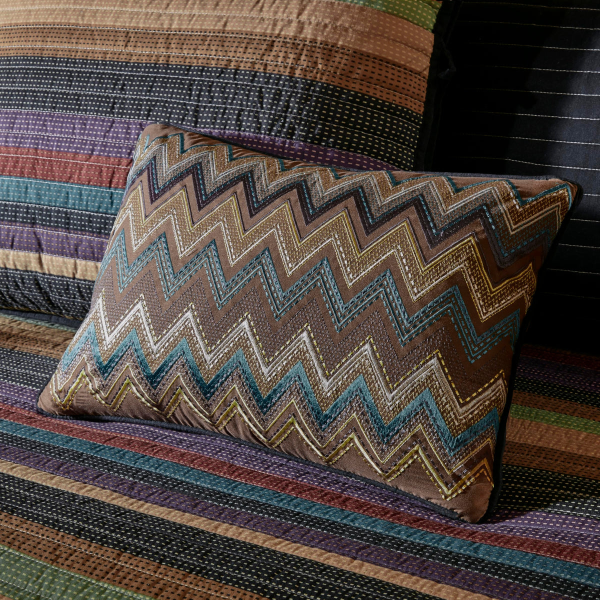 Madison Park Yosemite decorative pillow chevron detail enhances color pop.