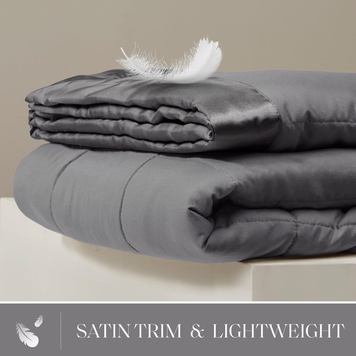Madison Park Windom satin trim detail adds a luxurious touch to any bed.