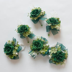 Artificial flowers with greenery and ribbon detail by MAFELOE