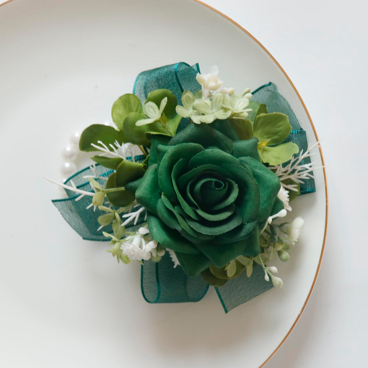 Boutonniere back with pins and clips for secure wearing