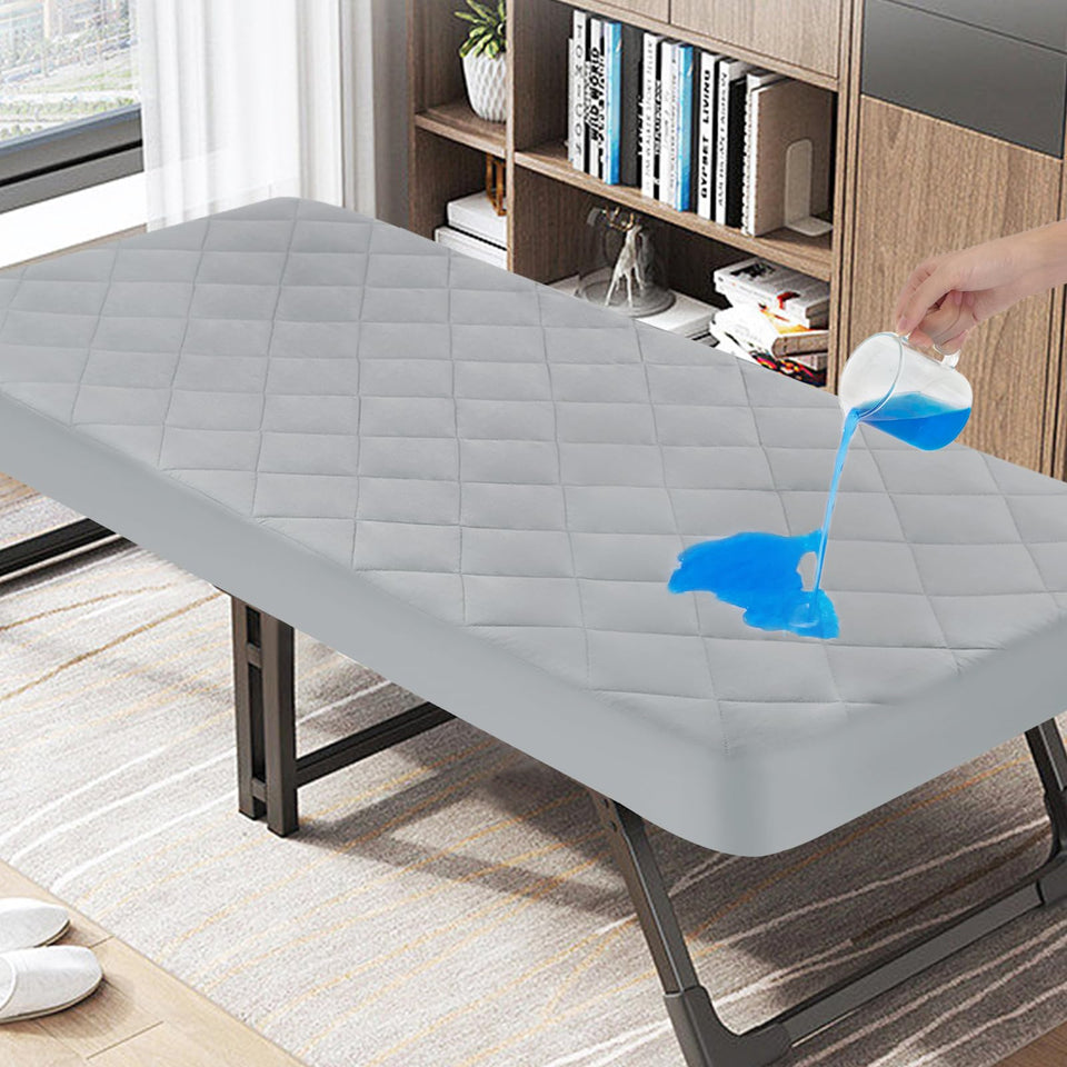 Magik & Kover cot mattress pad waterproof layer protecting the cot mattress