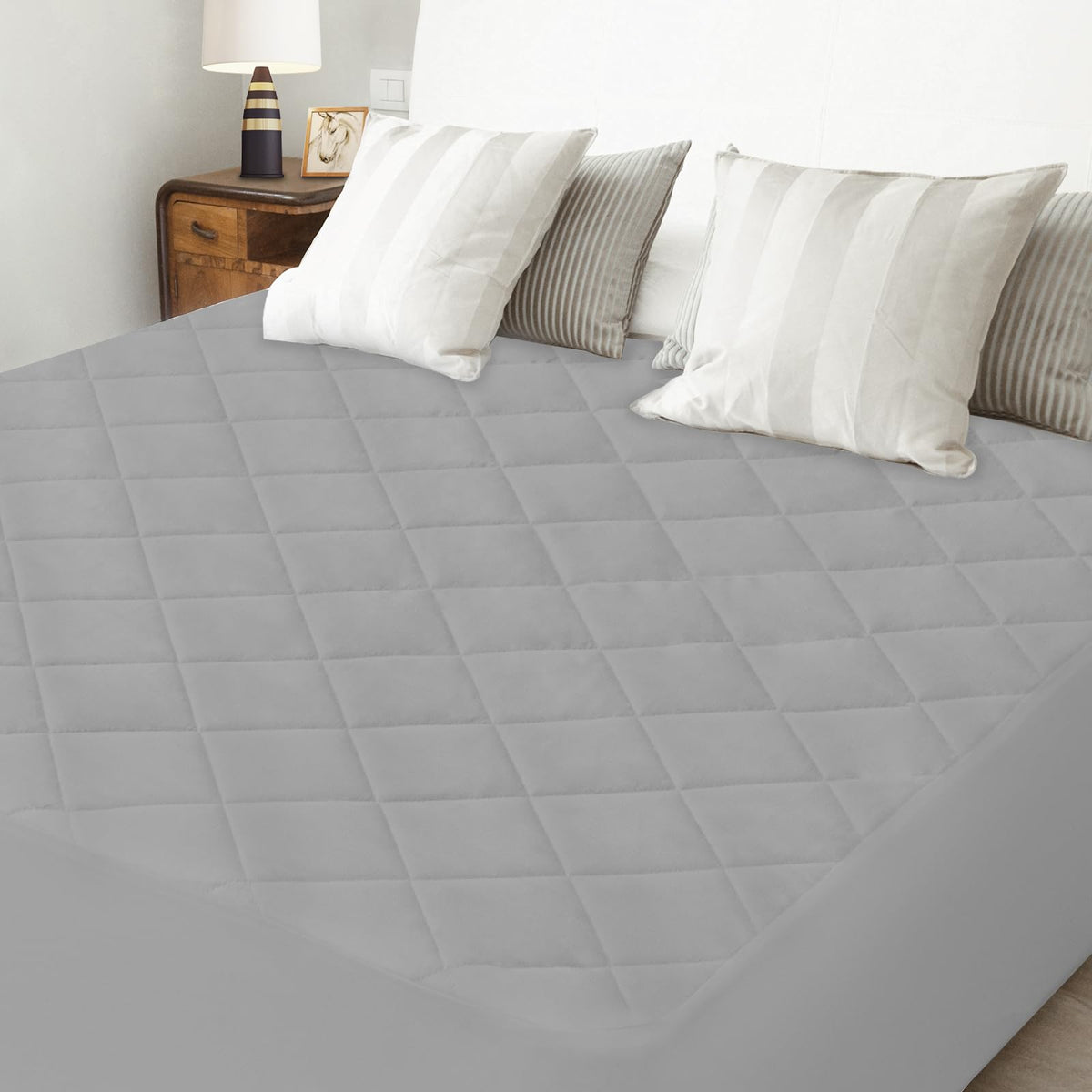 Magik & Kover fits most queen mattresses up to 23 inches thick.