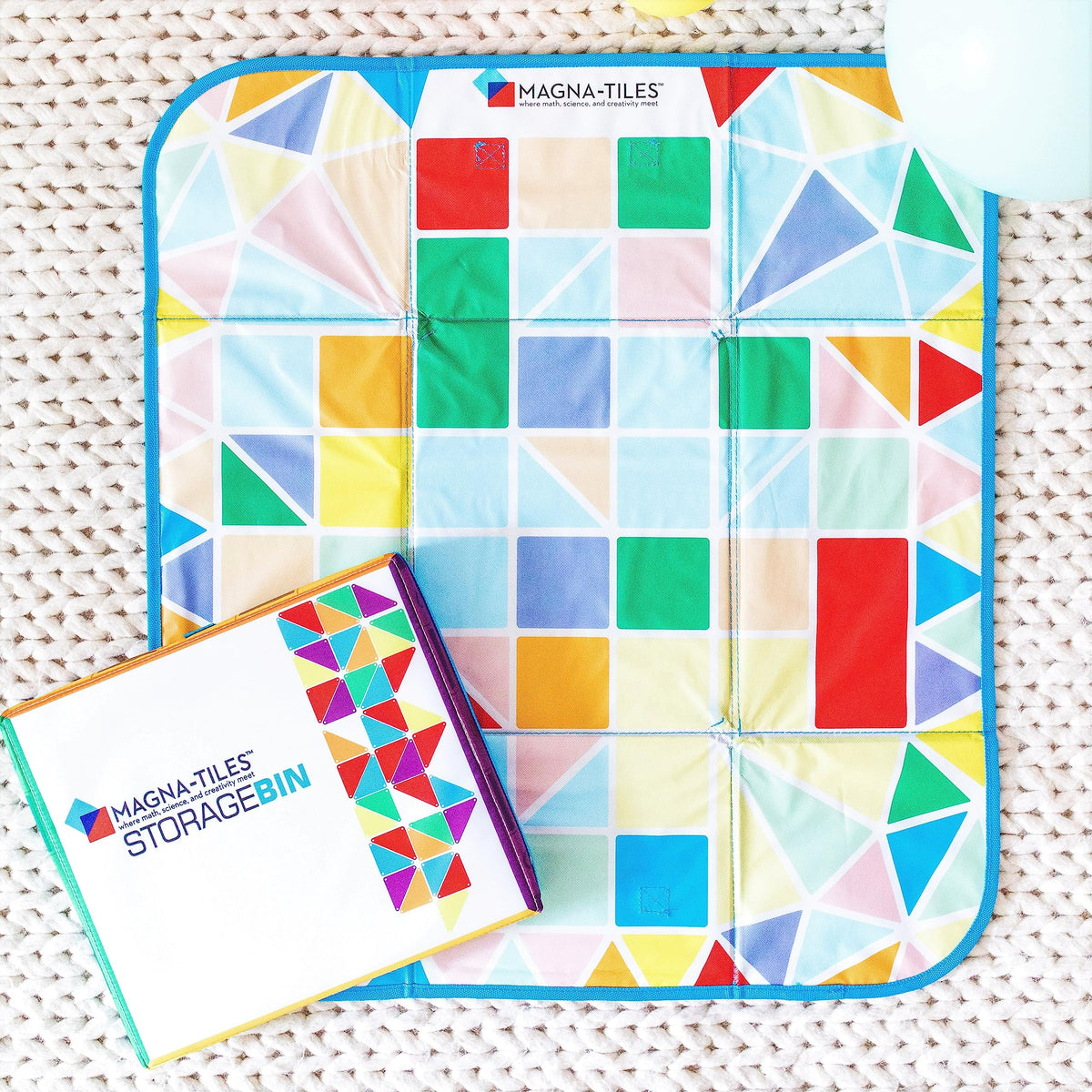 MAGNA-TILES side handles make it easy to move indoors or outdoors.