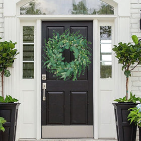 MAINGKAUNG White berries and pine cones add seasonal charm