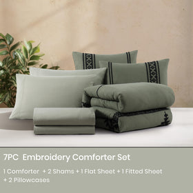 Two shams complete MaiRêve olive green embroidery bedding look