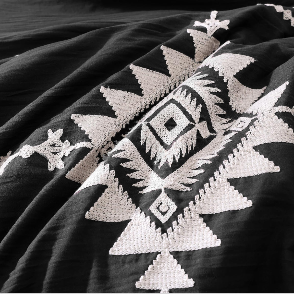 MaiRêve pillow shams styled with quilted embroidery for cohesive look