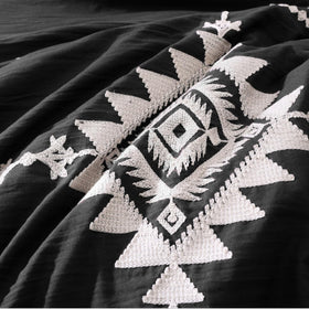 MaiRêve pillow shams styled with quilted embroidery for cohesive look