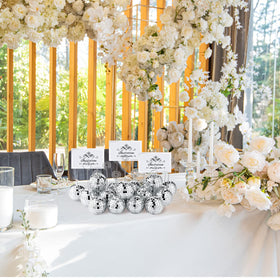 Maitys silver disco-ball appearance reflects light for standout table décor