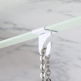 MAKALONE right and left ceiling hooks enable secure, adjustable hangs.